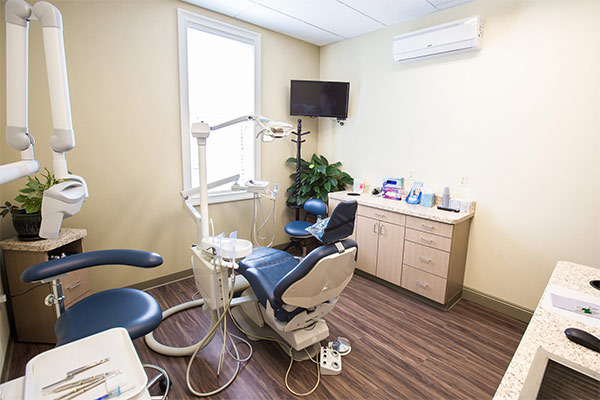 Dental exam room and exam chair at Masci, Hale & Wilson Advanced Aesthetic and Restorative Dentistry in Montgomery, NY