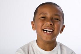 Smiling boy with missing tooth, at Montgomery, NY.